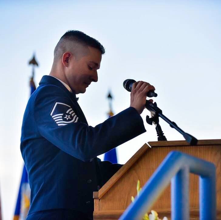 Jordan Herrera speaking at a podium